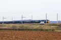 HS125 Train passing partially completed electrification