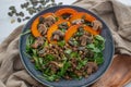 HSalad with baked pumpkin, lentils on a table