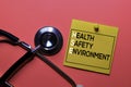 HSE. Health Safety Environment acronym on sticky notes. Office desk background