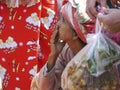 Thoughtful Burmese woman seating