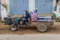 HSIPAW, MYANMAR - DECEMBER 3, 2016: Local people on a tractor in a village near Hsipaw, Myanm Royalty Free Stock Photo