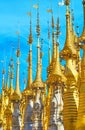 Hti umbrellas and weathervanes of Inn Thein Buddha image Shrine, Inle Lake, Myanmar Royalty Free Stock Photo