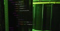 HTML code image over green-lit server room Royalty Free Stock Photo