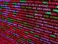 HTML code on lcd screen. Developer working on program codes in office. Software engineer at work. Letters, chars, and digits. Royalty Free Stock Photo