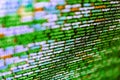 HTML5 concept macro backdrop in warm colors. Minificated web development javascript code close up in sunset rays. Php language and Royalty Free Stock Photo