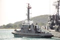 HTMS Rad YTM 856 tow HTMS Pinklao DE 413 away from pier Royalty Free Stock Photo