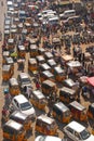 Busy congested traffic, overcrowded road with public transport car yellow electric rickshaw, motorcycles during rush hour, India