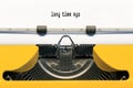 Long time ago typed on white paper on Yellow typewriter. Royalty Free Stock Photo