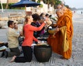 HUA HIN, THAILAND - DEC 28:Victoria Azarenka of Belarus pay respect to a monks. Before tennis Match Hua hin World Tennis Invitati