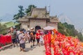 HUA SHAN, CHINA - AUGUST 4, 2018: People climb at the stairs at the Golden Lock Gate leading to the peaks of Hua Shan