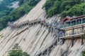 HUA SHAN, CHINA - AUGUST 4, 2018: People at stairs at the Hua Shan mountain in Shaanxi province, Chi