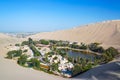 Huacachina with Ica in the Background Royalty Free Stock Photo