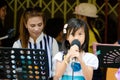 HUAHIN, Thailand : Little girl singing