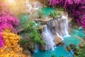 Waterfall colorful leaves in the summer is a beautiful waterfall with clear, flowing water, soft, emerald green color, suitable fo Royalty Free Stock Photo