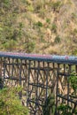 Huai tong concrete long and tall highway bridge in forest winter season, Phetchabun Thailand. Transportation and construction