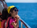 Hualien, Taiwan - September 22, 2018: A girl looking for dolphins at the coast of Hualien.