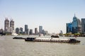 The Huangpu river in Shanghai with a lot of cargo ships transfering goods Royalty Free Stock Photo