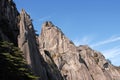 Huangshan Mountain in Anhui Province, China. Rocky cliffs and pine trees below the summit of Lotus Peak Royalty Free Stock Photo