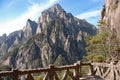 Huangshan Mountain in Anhui Province, China. View of mountain peaks, cliffs and trees near Sanxi Bridge and Fairy Walking Bridge Royalty Free Stock Photo