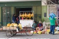 Huaraz, Ancash / Peru: 11 June 2016: horizontal view of indigent Indio farmer women sell their fruit and vegetables on the streets
