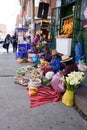 Huaraz, Ancash / Peru: 11 June 2016: indigent Indio farmer women sell their fruit and vegetables on the streets of Huaraz