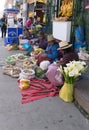 Huaraz, Ancash / Peru: 11 June 2016: indigent Indio farmer women sell their fruit and vegetables on the streets of Huaraz