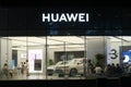 Huawei retail store logo and electric car Royalty Free Stock Photo