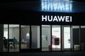 HUAWEI store at night and logo Royalty Free Stock Photo