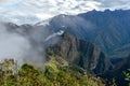 Huayna Picchu, or Wayna Pikchu, mountain in clouds rises over Machu Picchu Inca citadel, lost city of the Incas Royalty Free Stock Photo