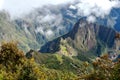 Huayna Picchu, or Wayna Pikchu, mountain in clouds rises over Machu Picchu Inca citadel, lost city of the Incas