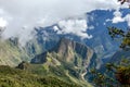 Huayna Picchu, or Wayna Pikchu, mountain in clouds rises over Machu Picchu Inca citadel, lost city of the Incas