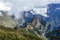 Huayna Picchu, or Wayna Pikchu, mountain in clouds rises over Machu Picchu Inca citadel, lost city of the Incas Royalty Free Stock Photo