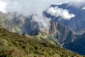 Huayna Picchu, or Wayna Pikchu, mountain in clouds rises over Machu Picchu Inca citadel, lost city of the Incas