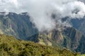 Huayna Picchu, or Wayna Pikchu, mountain in clouds rises over Machu Picchu Inca citadel, lost city of the Incas Royalty Free Stock Photo