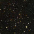 Hubble ultra deep field - cosmic space full of galaxies. Retouched image. Elements of this image furnished by NASA