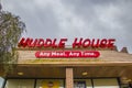 Huddle House Restaurant closed building sign front of building
