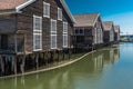 Hudiksvall, Halsingland, Gavleborg County -Sweden -Reflecting fishing warehouses in the city center Royalty Free Stock Photo