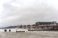 Hudson river in Winter with Misty Edgewater Cityscape in Background.