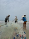 Hue, Quang Nam Province, Vietnam - January, 20, 2020: People`s daily life at the fishing village near Hue, they are collecting fre