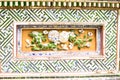 HUE, VIETNAM, April 28th, 2018: Fragment of an old wall with an ancient decorative element. Vietnam Royalty Free Stock Photo