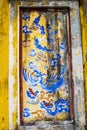 HUE, VIETNAM, April 28th, 2018: Fragment of an old wall with an ancient decorative element. Vietnam Royalty Free Stock Photo