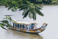 Hue, Vietnam - June 2019: traditional Vietnamese dragon boat sailing on Perfume river
