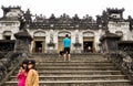 Tourists taking pictures on the grounds of Khai Ding Tomb, one of Imperial Tombs of Hue