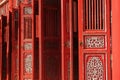 Hue / Vietnam, 17/11/2017: Red ornamental doors in a traditional pavillion in the Citadel complex in Hue, Vietnam