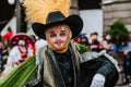 Huehues Mexico, mexican Carnival scene, dancer wearing a traditional mexican folk costume and mask rich in color