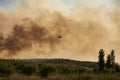 Huelva, Bonares, Spain August 05 2023: Infoca helicopter, Firefighters, prepares the trajectory to pour water on the forest fire