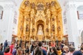 Crowd of people visiting the Image of the Virgen del Rocio, inside of the Ermita del Rocio,