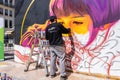 Huelva, Spain - April 24, 2022: The urban artist Victor Romero Konestilo is creating a workart in live of Graffiti, on the Royalty Free Stock Photo