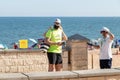 Huelva, Spain - July 4, 2020: Beach safety guard of Junta de Andalucia is controlling the access to Islantilla beach for