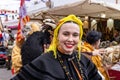 A beautiful young woman dressed in Galician period costume, in the parade of Medieval Discovery